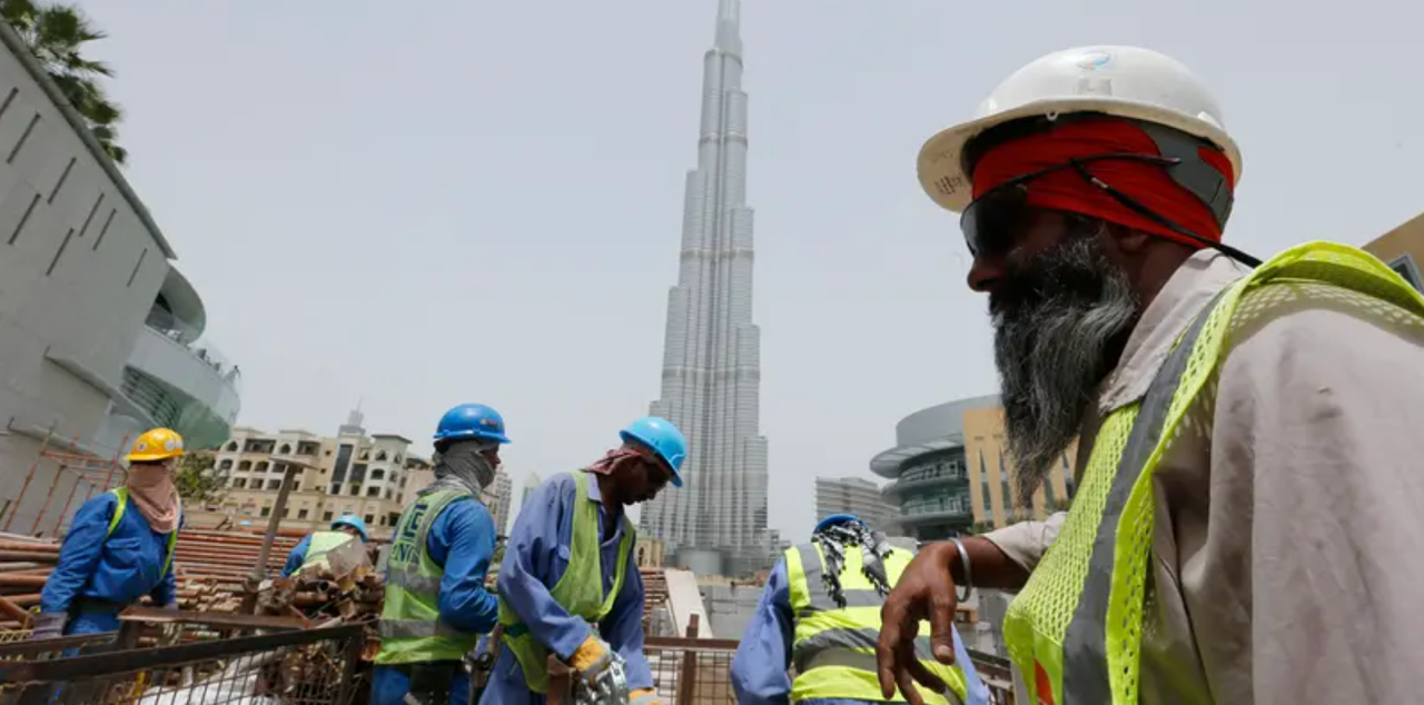 Construction workers in the United Arab Emirates where a midday break was enacted, limiting workers' exposure to direct sunlight in the harshest hours during the summer months. Courtesy of Sam.