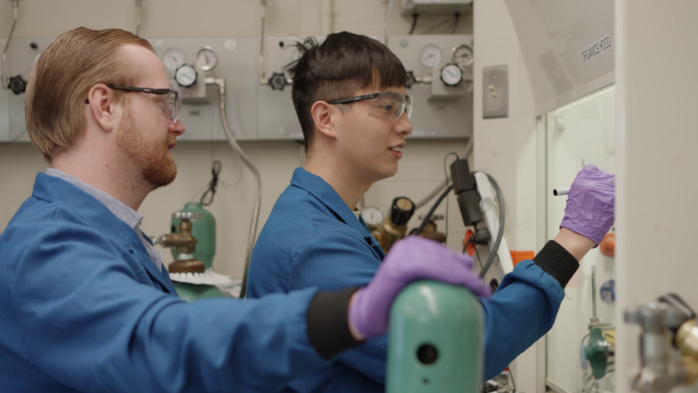Glen Junor (left) and Fang-Yu Kuo (right) in the lab at MIT.